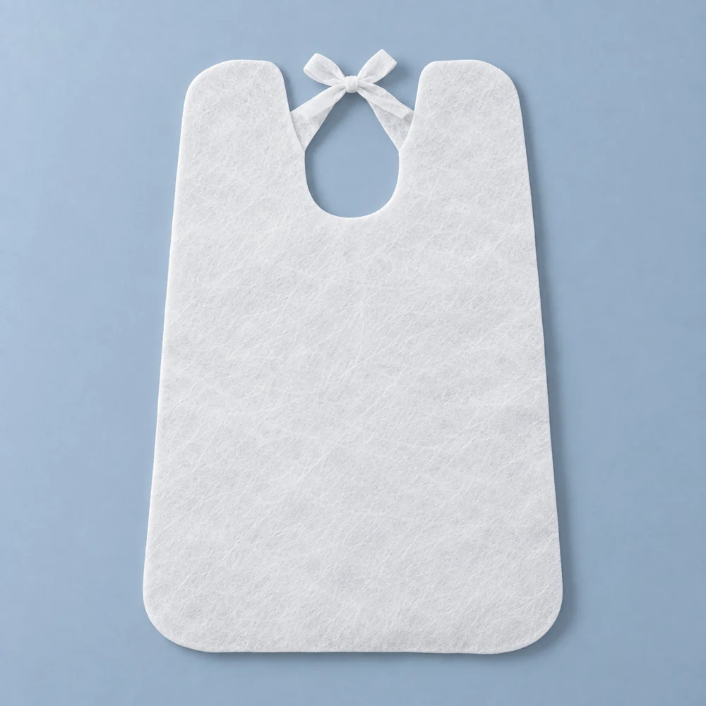 White nonwoven salon bib with neck ties