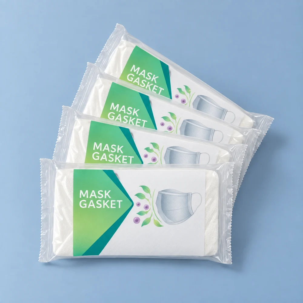 Four packs of disposable mask gasket pads in green packaging